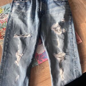 Levi's Light Blue Relaxed Jeans with Distressed Details